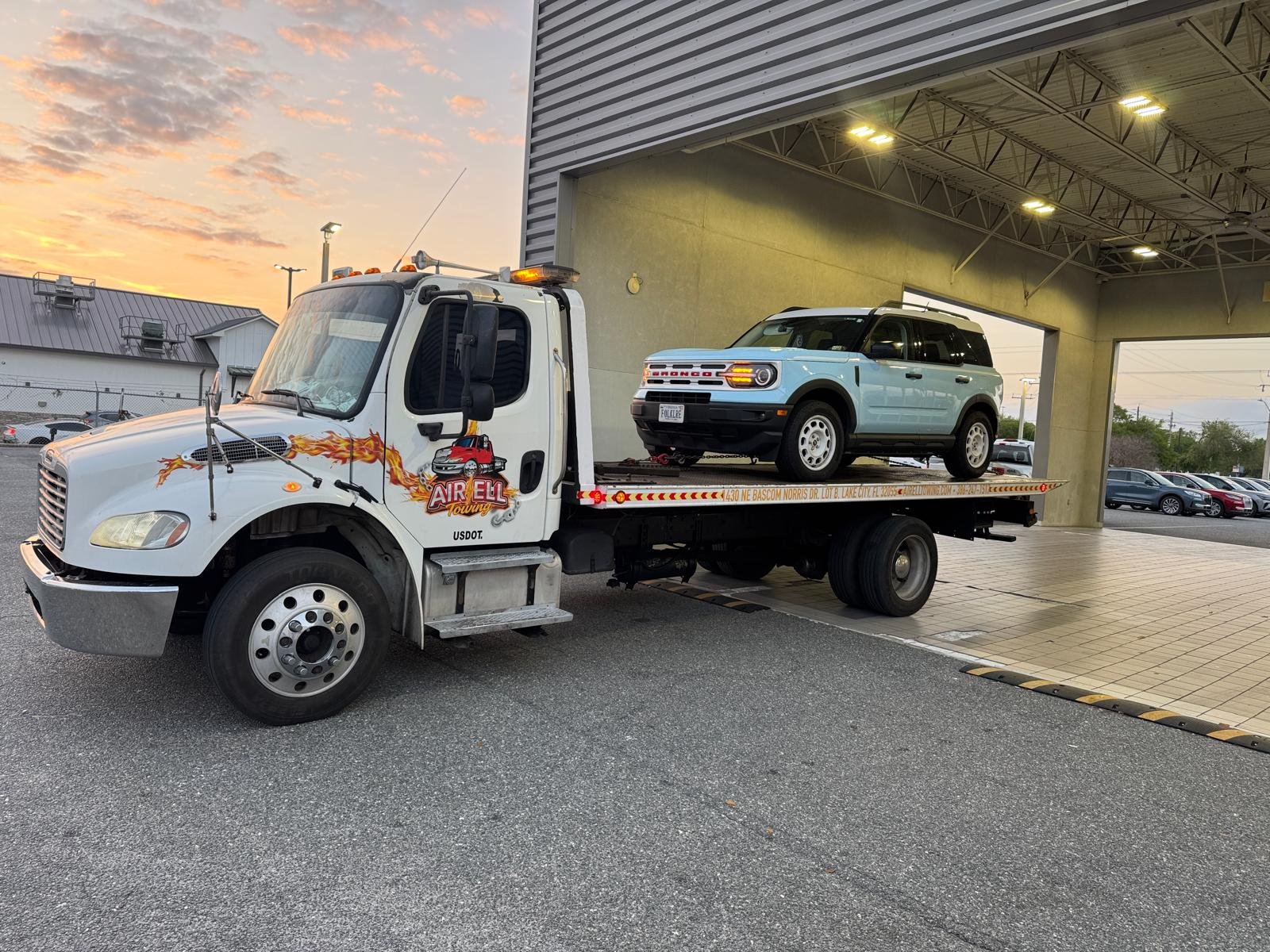 Airell Towing Flatbed Truck Lake City